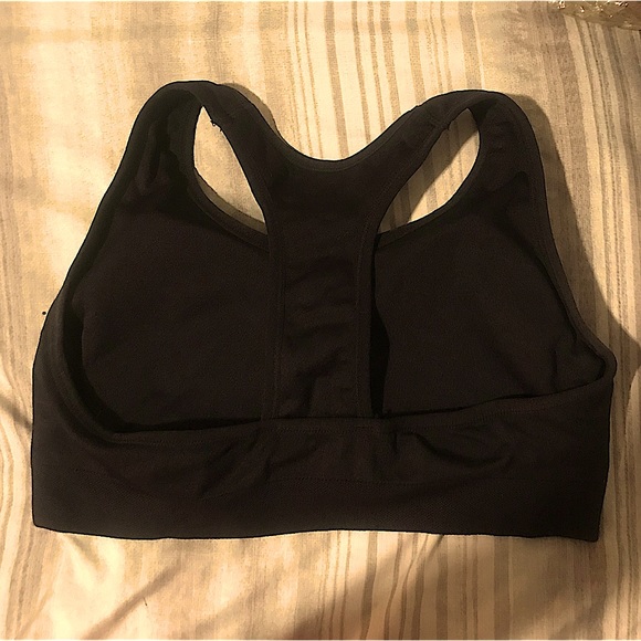 Black Puma sports bra with classic Puma logo. Size M with removable padding - Picture 2 of 3